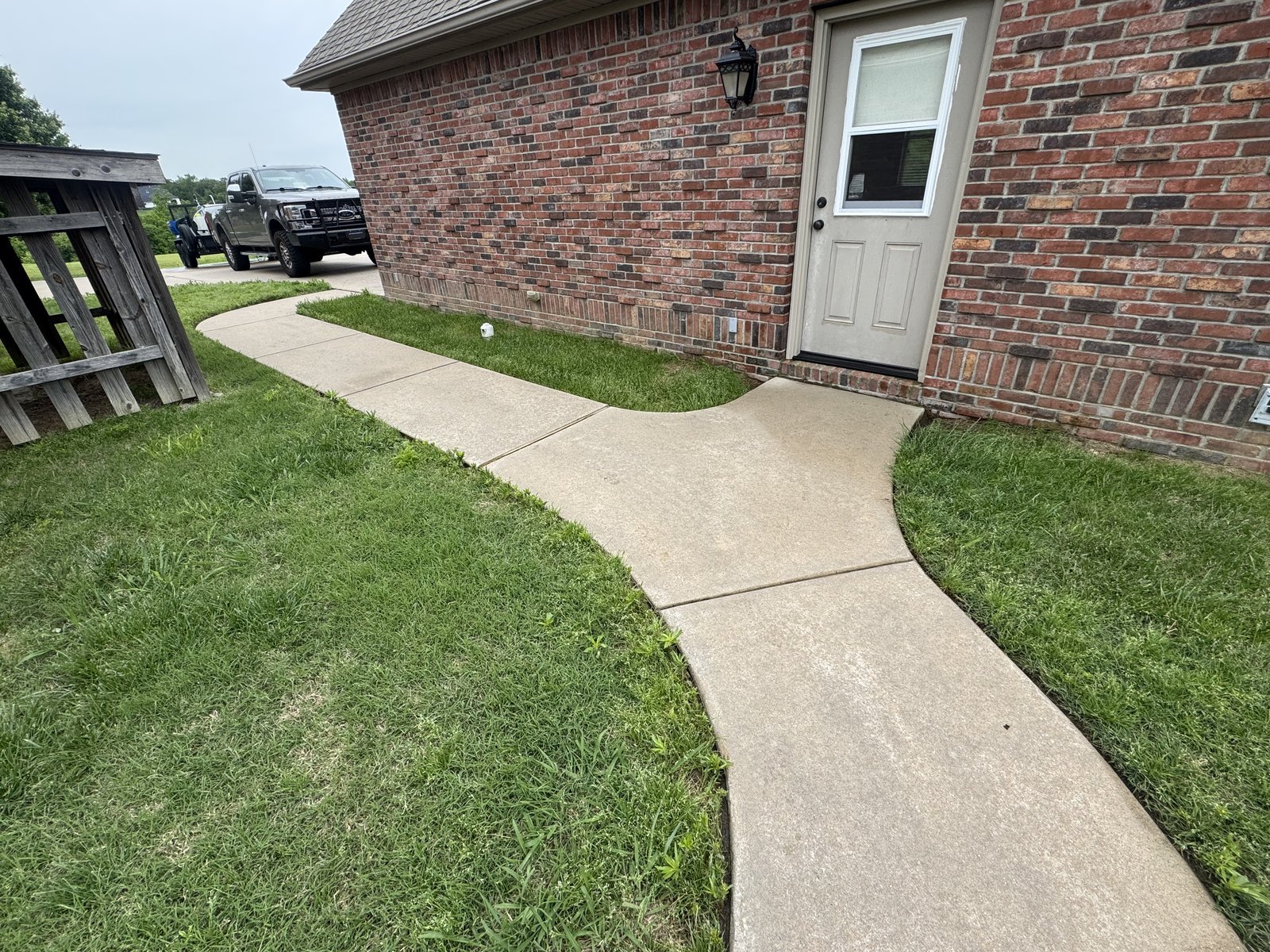 Brick house walkway after pressure washing